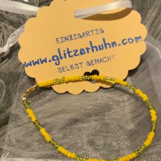 Armband mit kleinen Glasperlen gelb-grün