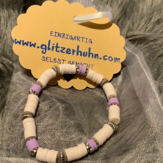 Armband rose-lilafarben mit Metallperlen